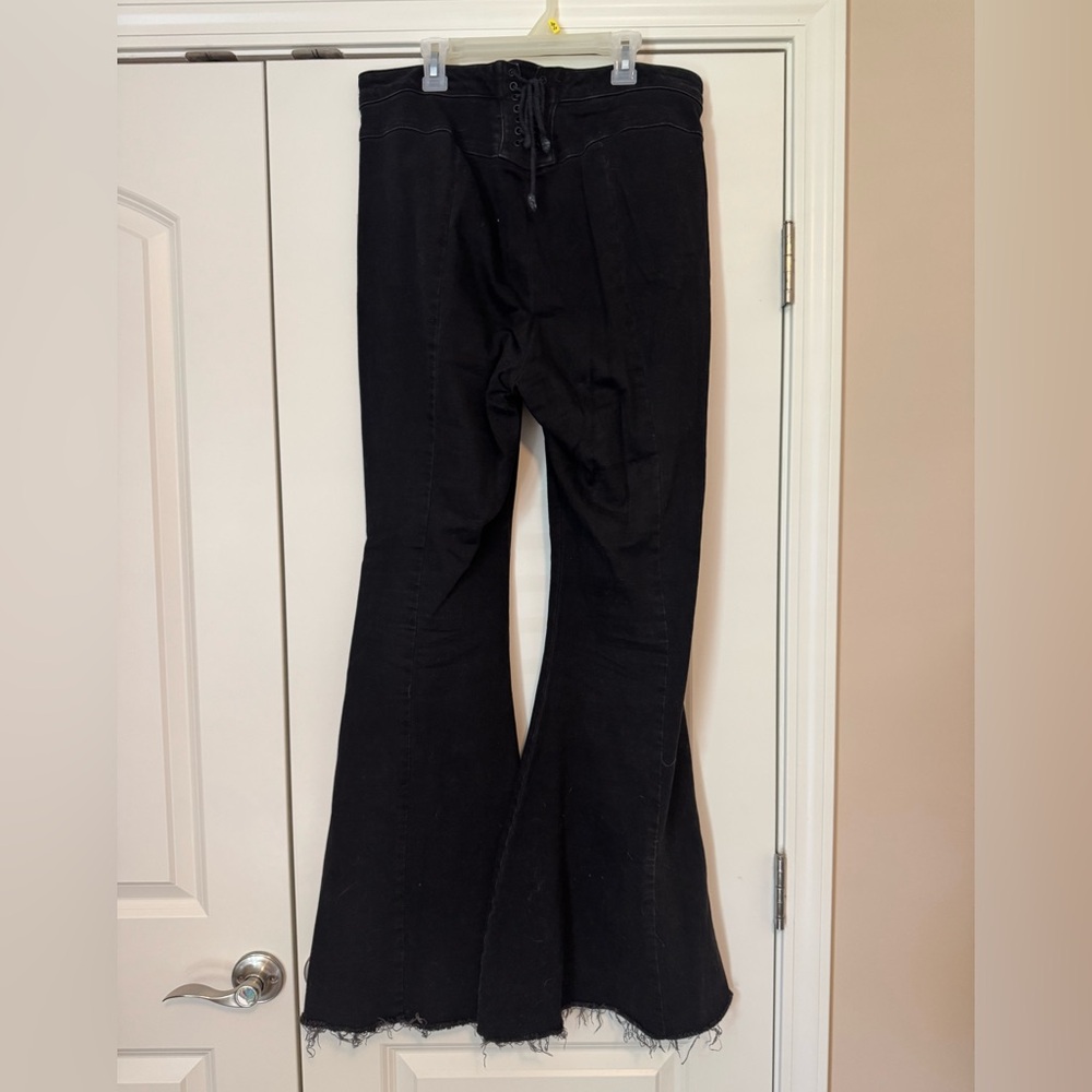 Free People lace up flare jeans
